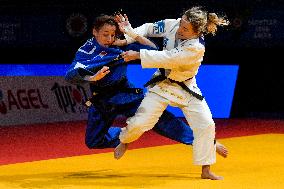 Distria Krasniqi, Melanie Clement