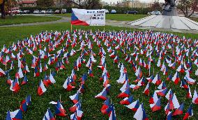 Covid-19, coronavirus memorial, Czech flags, park, Prague