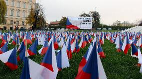Covid-19, coronavirus memorial, Czech flags, park, Prague
