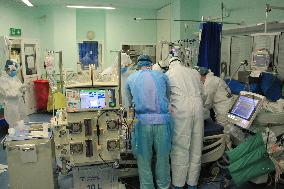 University Hospital Kralovske Vinohrady, department of anesthesiology and resuscitation for patients with COVID-19 disease, medical staff, protective clothing, suit, healthcare professionals, breathing mask, filter