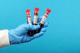 Test, testing, covid-19, coronavirus, vaccine, protective clothing, gloves, blood, laboratory flash, antibodies, research, glass tube, tubes