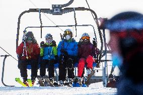 Skiareal Spicak, Czech Republic, Sumava, Bohemian Forest, skiers, chairlift