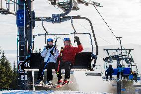 Skiareal Spicak, Czech Republic, Sumava, Bohemian Forest, skiers, chairlift