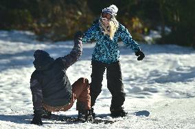 Skiareal Lipno, Bohemian Forest, Sumava, Czech Republic, snowboarders, beautiful weather, sun