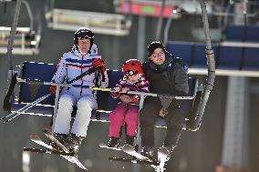 Skiareal Lipno, Bohemian Forest, Sumava, Czech Republic, skiers, chairlift