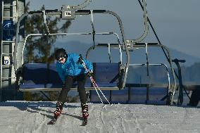 Skiareal Lipno, Bohemian Forest, Sumava, Czech Republic, skiers, chairlift