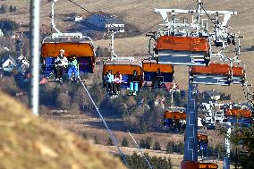 Skiareal Klinovec, Ore Mountains, Czech Republic, skiers, chairlift