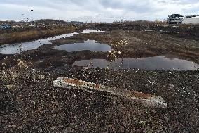 Ostramo, chemical plant, oil lagoons clean-up