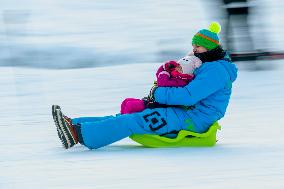 People, children, bob, sun weather, snow, mountain, ski-areal Svaty Petr, Spindleruv Mlyn