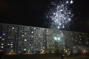 New Year's Eve celebration in the panel housing estate Jizni Mesto (South Town) in Prague, firework