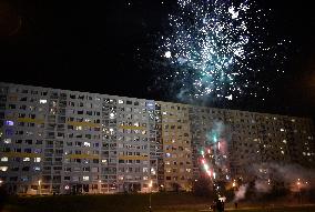 New Year's Eve celebration in the panel housing estate Jizni Mesto (South Town) in Prague, firework