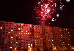 New Year's Eve celebration in the panel housing estate Jizni Mesto (South Town) in Prague, firework