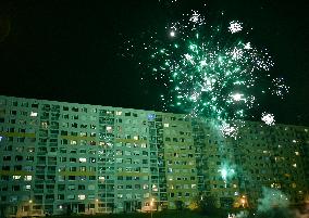 New Year's Eve celebration in the panel housing estate Jizni Mesto (South Town) in Prague, firework