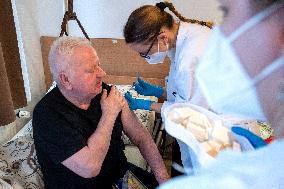 Vaccination against coronavirus, Czech Republic, syringe, senior