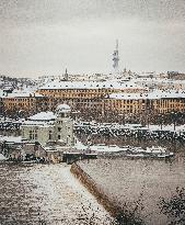 Vltava river, Stvanice island, Ministry of Transportation, television tower, snow