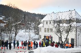 queue of commuters waiting for mandatory coronavirus tests in Bayerisch Eisenstein