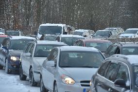 queue of commuters waiting for mandatory coronavirus tests at Czech-German border in Pomezi nad Ohri