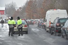 queue of commuters waiting for mandatory coronavirus tests at Czech-German border in Pomezi nad Ohri