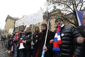 Some 50 protesting against anti-COVID rules outside Government Office