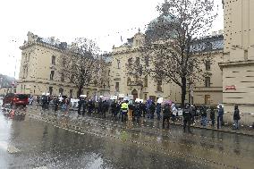 Some 50 protesting against anti-COVID rules outside Government Office