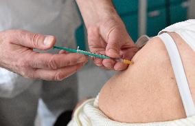 Vaccination of seniors against coronavirus, Czech Republic, syringe, senior