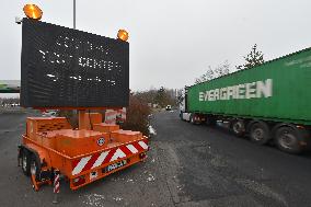 light board shows the direction to the COVID-19 test center, coronavirus, lorry, border crossing