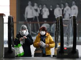 people, respirators, shopping center