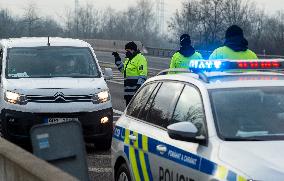 Police control, policemen, car, highway D8, epidemic restrictions