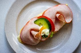 open sandwich, plate, ham, vegetable.