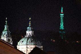 Petrin Tower is green illuminated to celebrate St. Patrick's Day in Prague