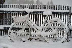 snow-covered bicycle