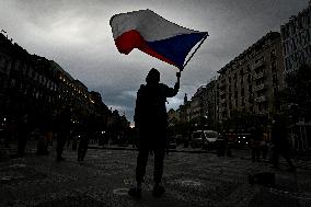 People, demonstrations against pro-Russian stances of President Milos Zeman, Andrej Babis, PM, flag
