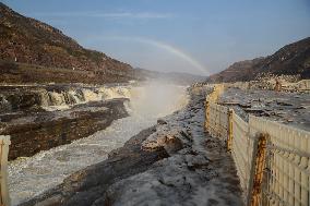 Ice Hanging Rainbow At Hukou Waterfall of Yellow River