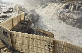 Ice Hanging Rainbow At Hukou Waterfall of Yellow River