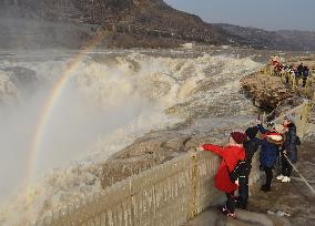 Ice Hanging Rainbow At Hukou Waterfall of Yellow River