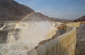 Ice Hanging Rainbow At Hukou Waterfall of Yellow River