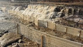 Ice Hanging Rainbow At Hukou Waterfall of Yellow River