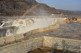 Ice Hanging Rainbow At Hukou Waterfall of Yellow River