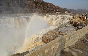 Ice Hanging Rainbow At Hukou Waterfall of Yellow River