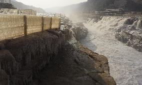 Ice Hanging Rainbow At Hukou Waterfall of Yellow River