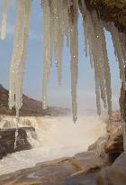 Ice Hanging Rainbow At Hukou Waterfall of Yellow River