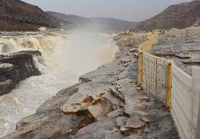 Ice Hanging Rainbow At Hukou Waterfall of Yellow River