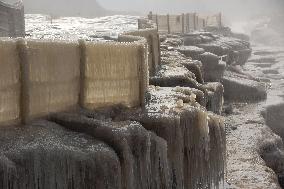 Ice Hanging Rainbow At Hukou Waterfall of Yellow River