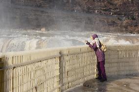 Ice Hanging Rainbow At Hukou Waterfall of Yellow River