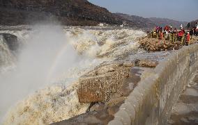 Ice Hanging Rainbow At Hukou Waterfall of Yellow River