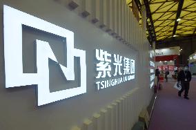 Tsinghua Unigroup's Credit Rating Downgraded