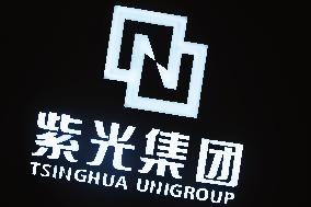 Tsinghua Unigroup's Credit Rating Downgraded