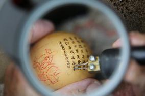 Calabash Pyrographic Works With Theme of OX