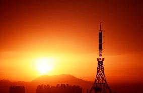 Signal Tower Under The Morning Glow