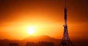 Signal Tower Under The Morning Glow